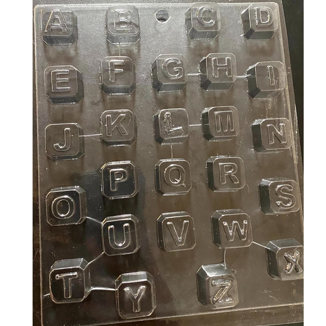 Abecedario cubos 2x2 cms acetato